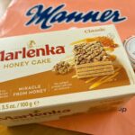 Box of Marlenka Honey Cake (Classic), showing a slice with honey drizzle and walnuts on the package image.