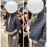 Two-panel scene of a person trying on a denim jacket in a store, an assistant adjusts the collar in the left panel and a patterned scarf is worn in the right panel (faces obscured).